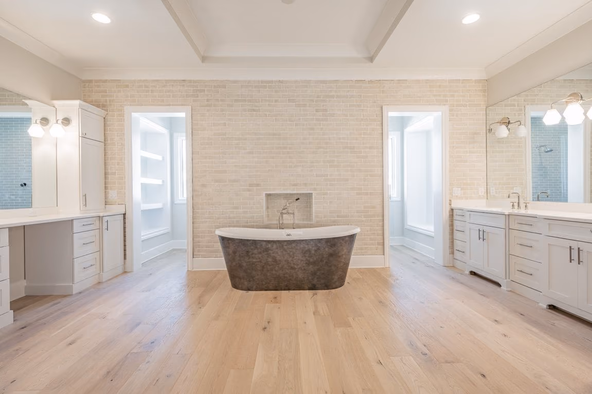 Primary bath with a freestanding stone tub