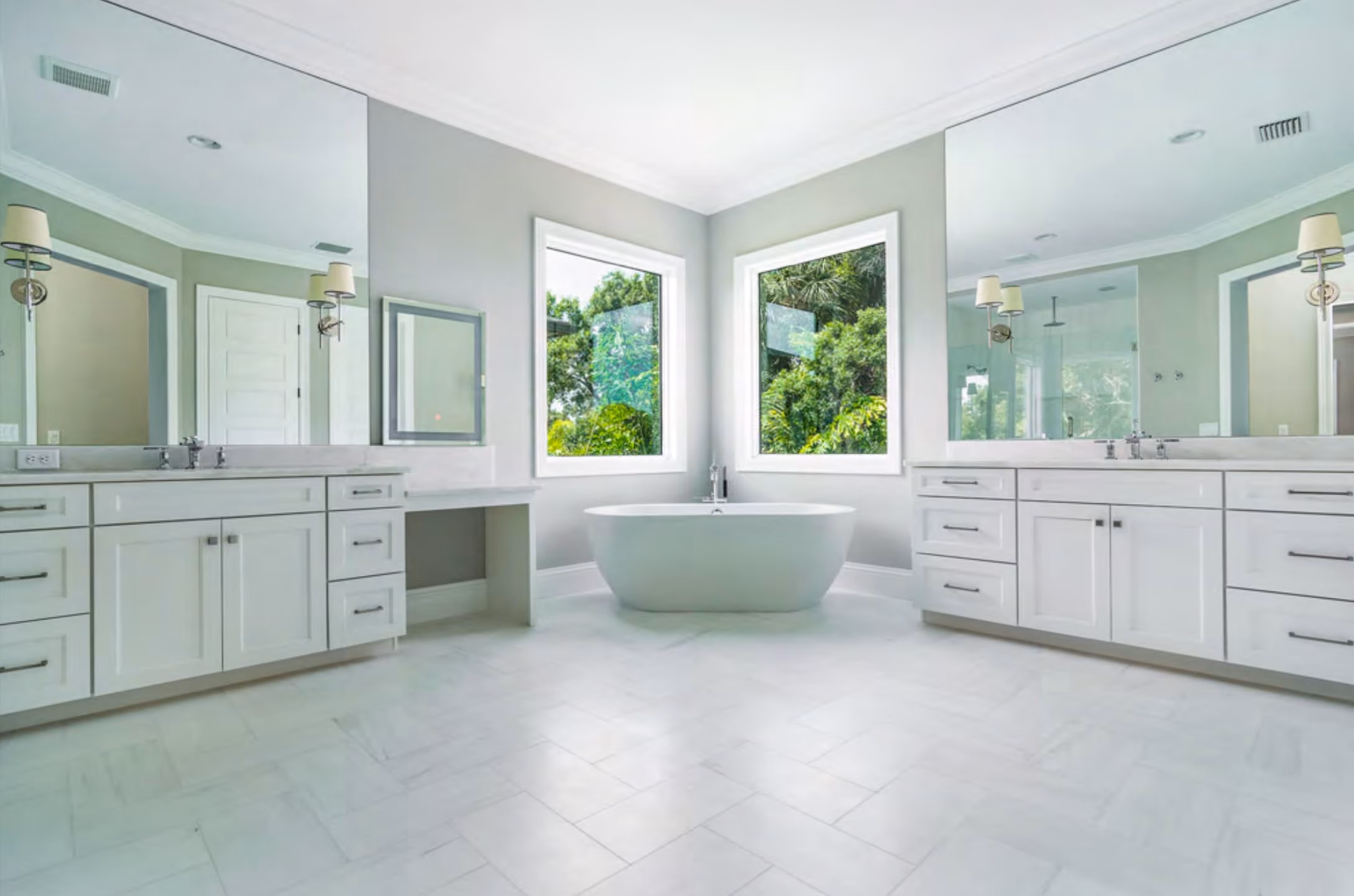 Bathroom with a freestanding tub and a double vanity